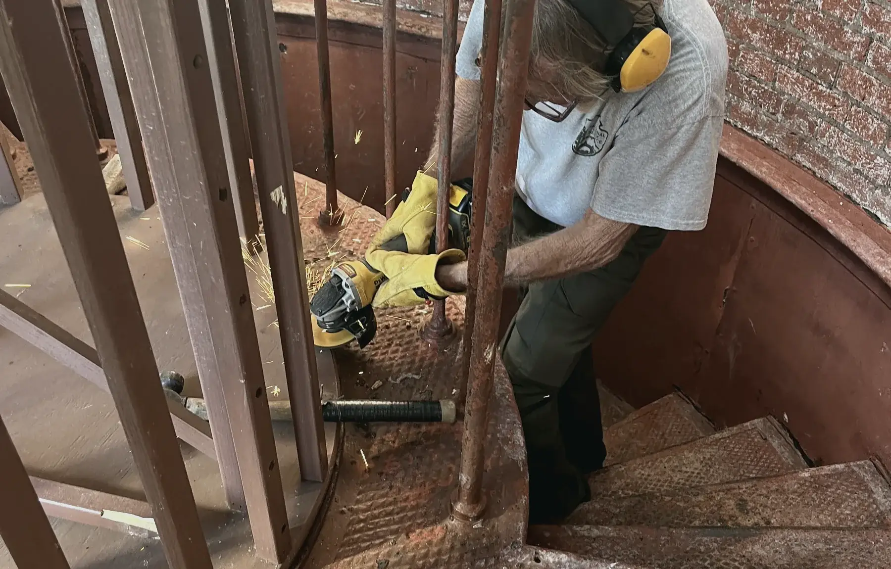 Property maintenance worker using professional equipment
